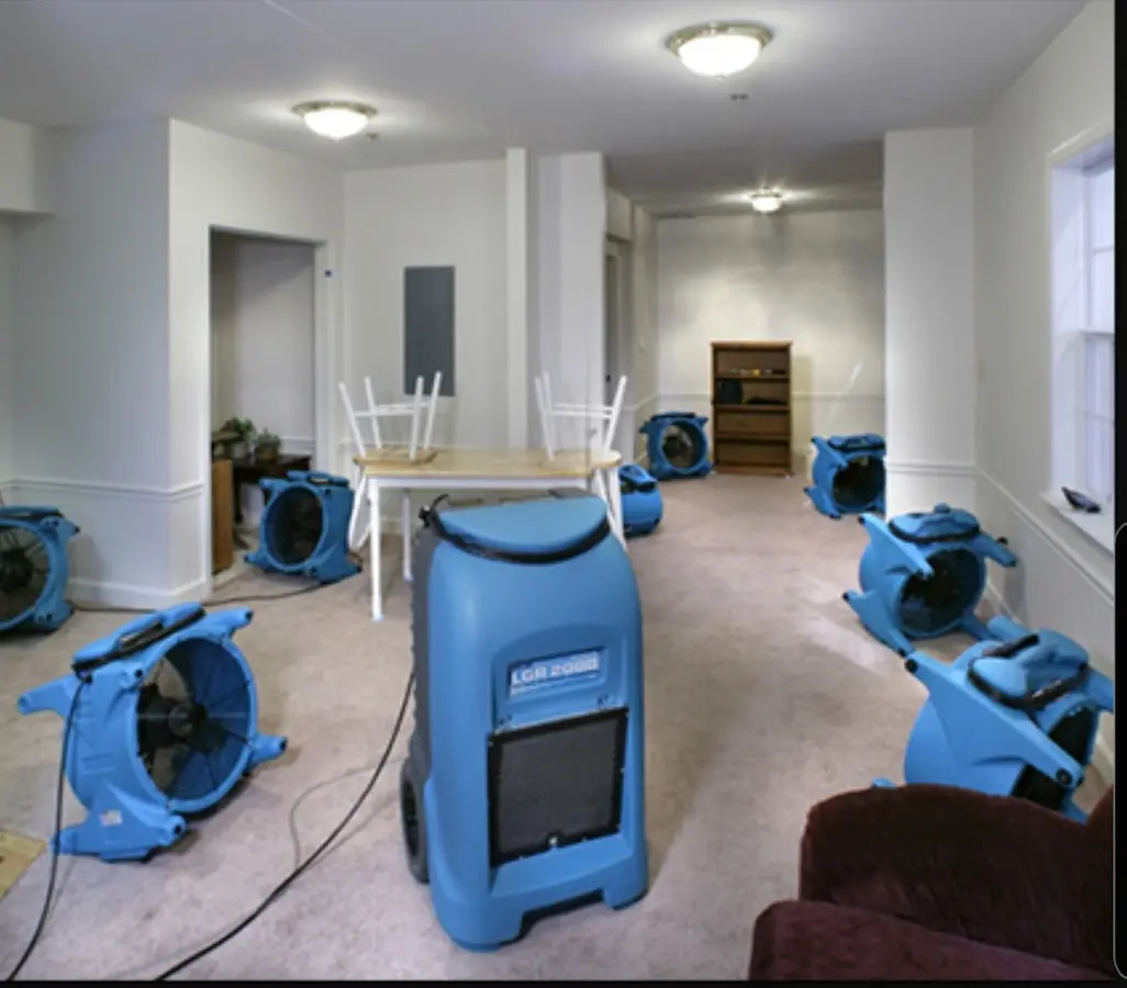 Air movers and dehumidifier setup for Water Damage Restoration in North Port